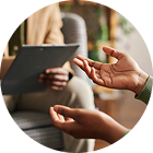 Therapist and client in session with focus on expressive hand gestures