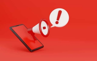 megaphone-with-security-alert-chat-bubble-and-smartphone-isolated-on-red-background-inaccurate-phone-data-getty